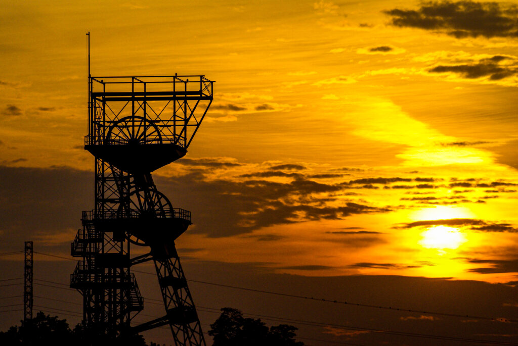 A headframe in a coal mine at sunrise. Katowice, Poland A headframe in a coal mine at sunrise. Katowice, Poland